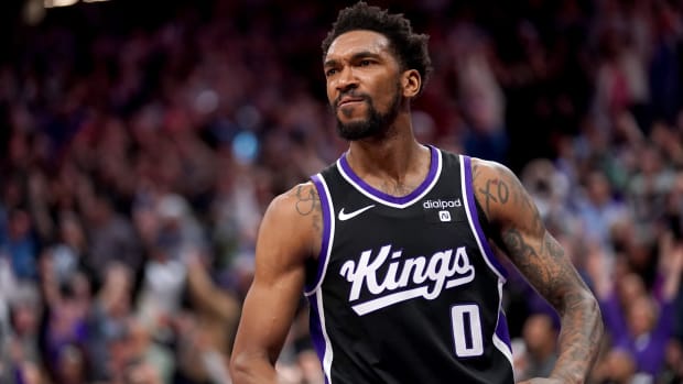Sacramento Kings guard Malik Monk (0) reacts after the Kings defeated the San Antonio Spurs at the Golden 1 Center.
